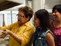 Three generations cooking together