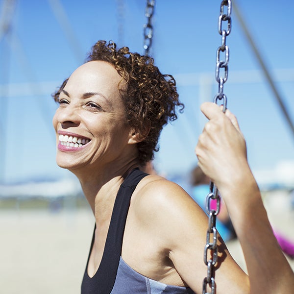 Enthusiastic woman swinging